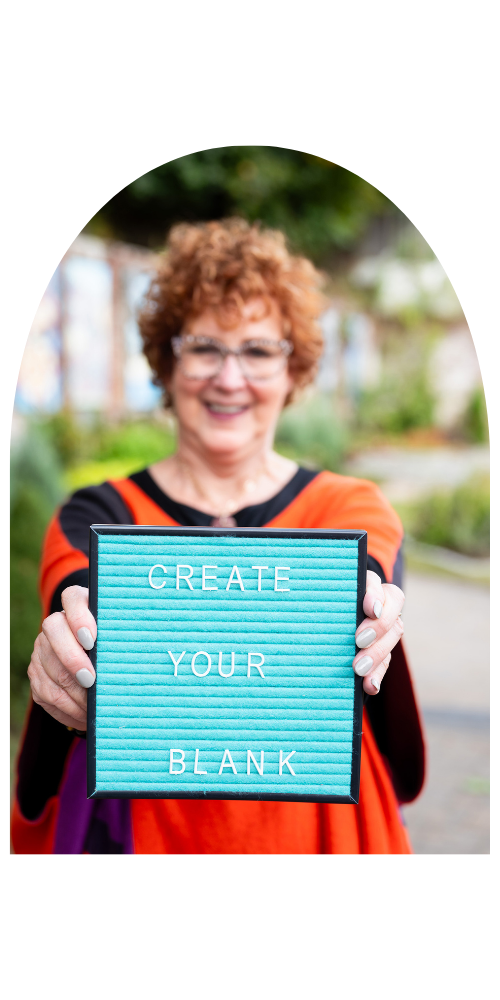 a photo of Allison Field holding a sign that says Create Your Blank